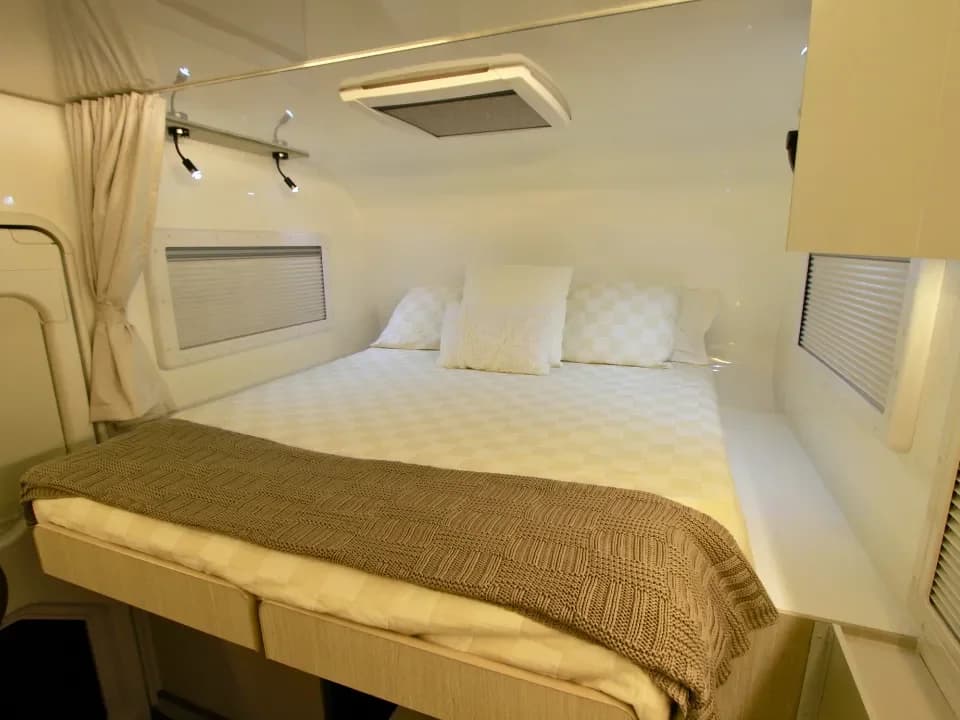 Suncamper Conqueror 3.0 North South Queen bed configuration